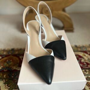 Black and white slingback heels! Simple and adorable! Lightly worn